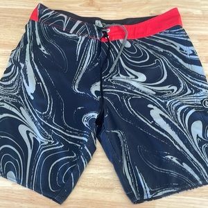 Volcom board shorts size  36 blue white swirl red waist.